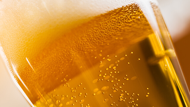 beer glass close up with froth-smaller